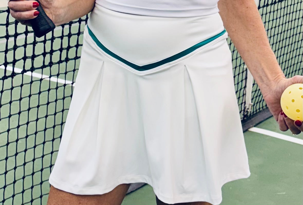 Active High Waist White Pleated Skirt with Green Trim and Built in Pocketed Shorts